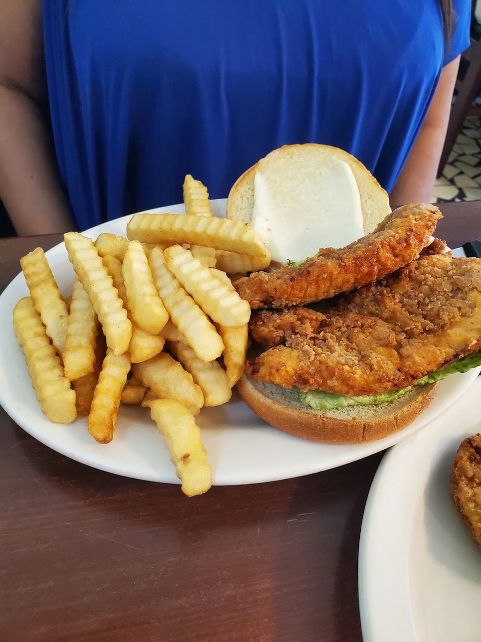 Plates of American restaurant food.